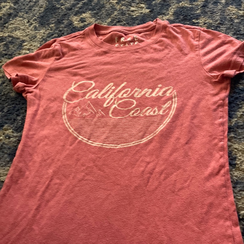 a red tee with print